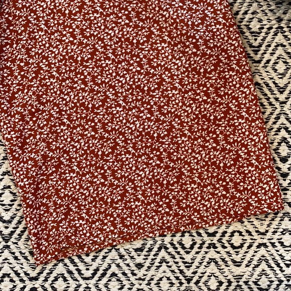 Cute burnt orange, floral jumpsuit, gently used - Picture 2 of 5